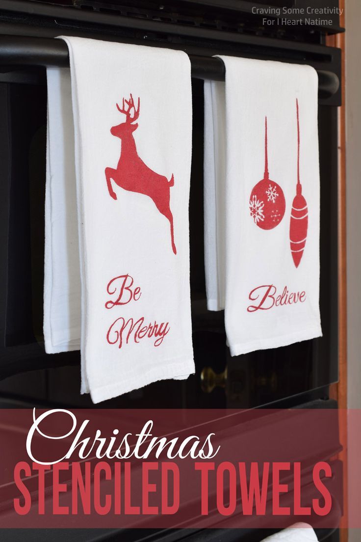 christmas towels hanging on the oven with text overlay