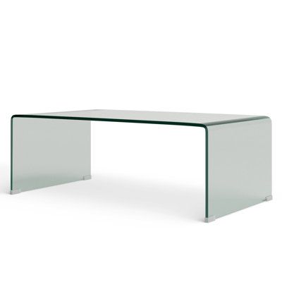 an office desk with a glass top and metal legs, viewed from the front view