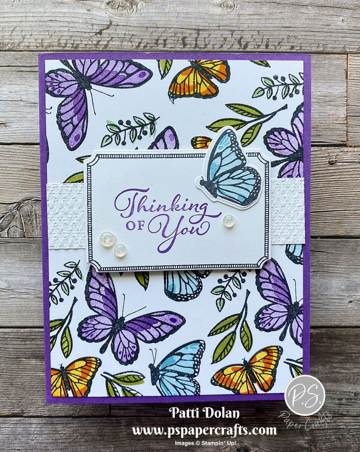 a handmade card with butterflies on it