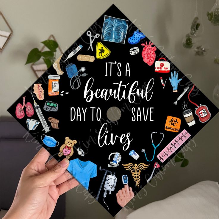 someone is holding up a graduation cap that says it's a beautiful day to save lives