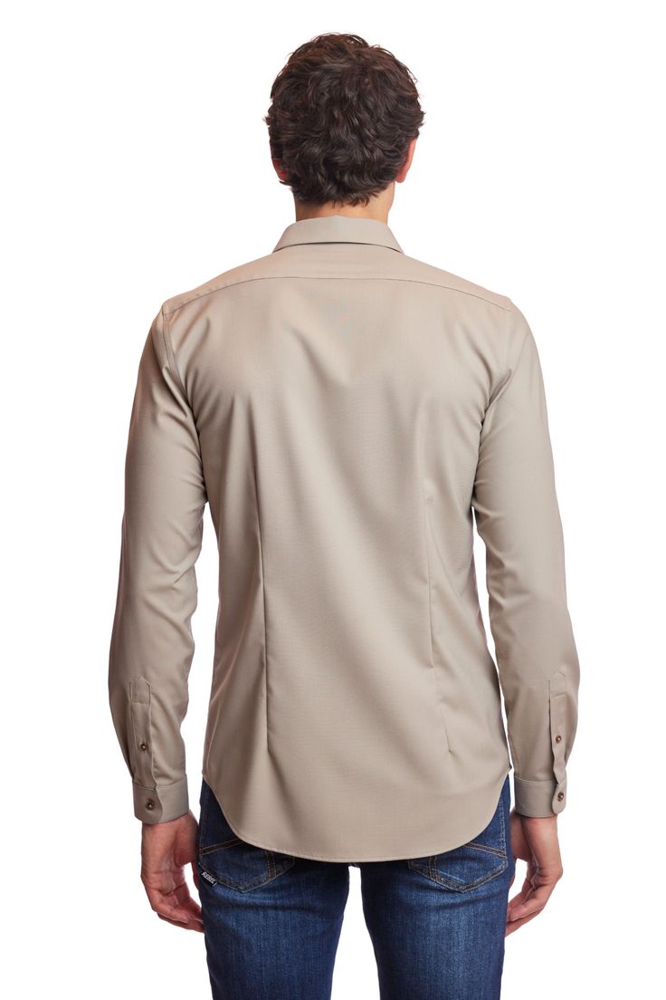 An elegant slim-fit spread collar shirt in oatmeal beige. Poly-rayon stretch gives this shirt a comfortable, yet elegant appearance that can be worn all year long. This shirt can be worn with a variety of tops and bottoms.PRODUCT DETAILS: style 6517W slim fit dress shirt spread collar printed fabric poly-rayon stretch blend dry clean only imported Classic Long Sleeve Neutral Shirt, Fitted Khaki Button-up Shirt, Fitted Khaki Collared Shirt, Classic Collared Shirt In Neutral Color, Classic Beige Shirt For Business Casual, Beige Spread Collar Top For Business Casual, Beige Collared Shirt For Business Casual, Elegant Beige Business Tops, Elegant Beige Business Top