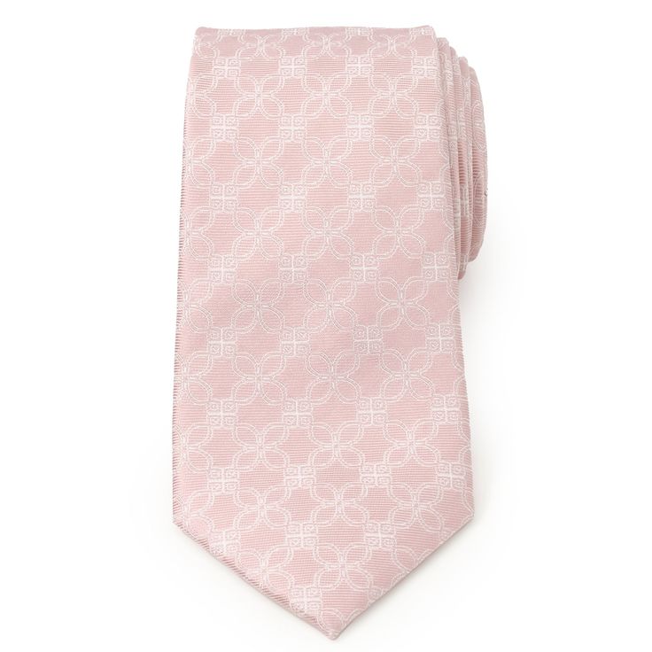 Un impresionante patrón art deco floral blanco crea el diseño de esta corbata rosa para hombre.  El diseño único y fascinante cubre la corbata de arriba a la cola y se puede usar para eventos casuales y formales o traer un ambiente fresco a la oficina.  Nuestra corbata mantendrá su forma y mantendrá un nudo perfecto gracias a la duradera y suave 100% Seda. Elegant White Ties For Spring, Elegant White Spring Ties, Elegant Pink Standard Tie, Elegant Pink Standard Tie And Accessories, Elegant Pink Standard Tie Suit Accessories, Elegant Pink Ties For Black Tie Occasions, Pink Business Ties For Spring, Elegant Patterned Summer Ties, Elegant Summer Patterned Ties