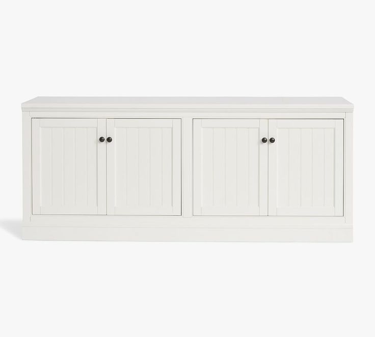 a white cabinet with three doors and two drawers on the front, against a white background