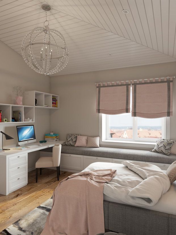 a bedroom with a bed, desk and computer