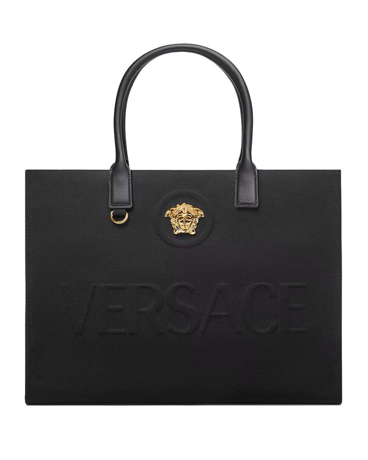 Versace La Medusa Canvas Large Fabric Tote Bag La Medusa hardware Raised logo lettering Double top handles with internal protector strap Internal zipped pocket 15.7” L x 6.3” W x 11.8" H Made in Italy Fabric Tote Bag, Fabric Tote Bags, Fabric Tote, Letter Logo, Calf Leather, Versace, Zip Pockets, In Italy, Handles