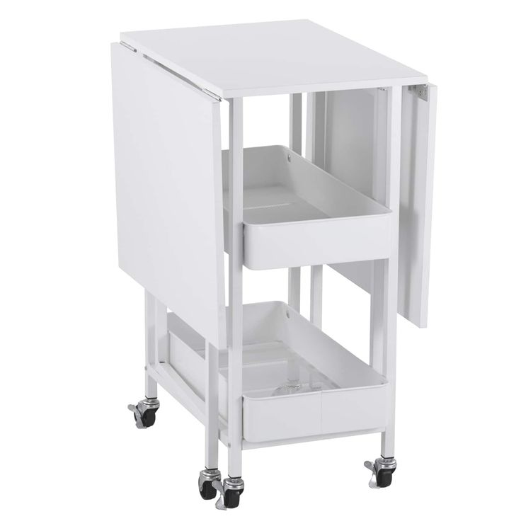 a white kitchen cart with two drawers and wheels on the bottom, in front of a white background