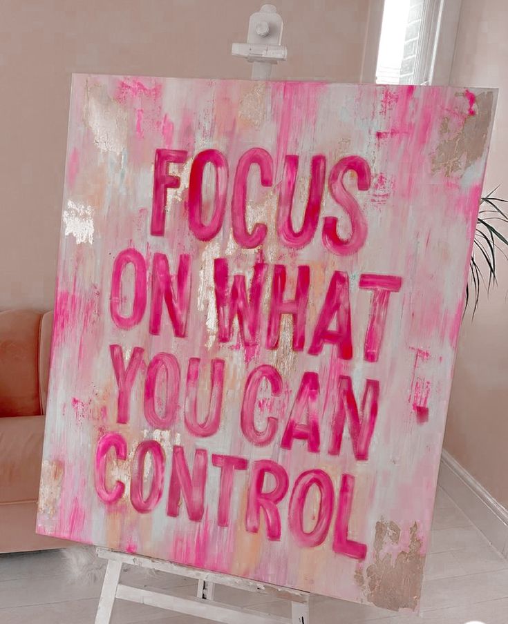 a pink and gold painting with the words focus on what you can control