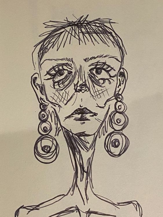 a drawing of a woman's face with large earrings on her ear and nose