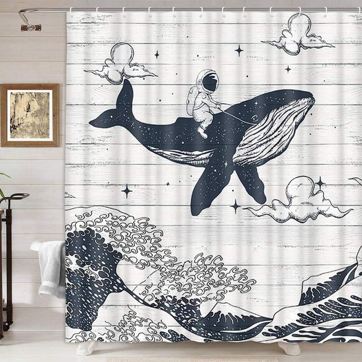 a shower curtain with an image of a man riding a whale