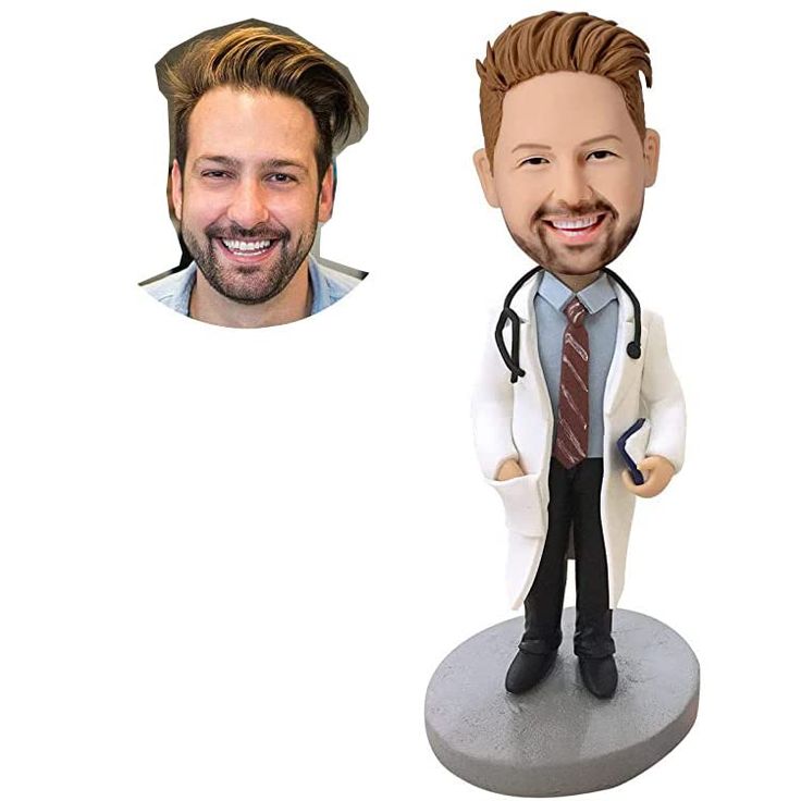 a male doctor bobble head with a white coat and tie