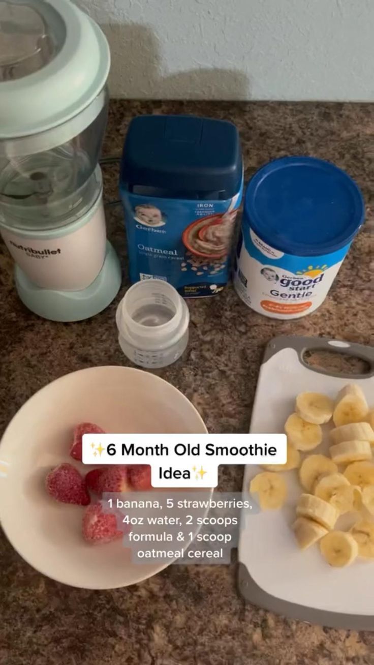 the ingredients to make an ice cream smoothie are displayed on a granite counter top