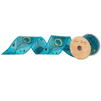 two rolls of blue ribbon with peacock feathers on them