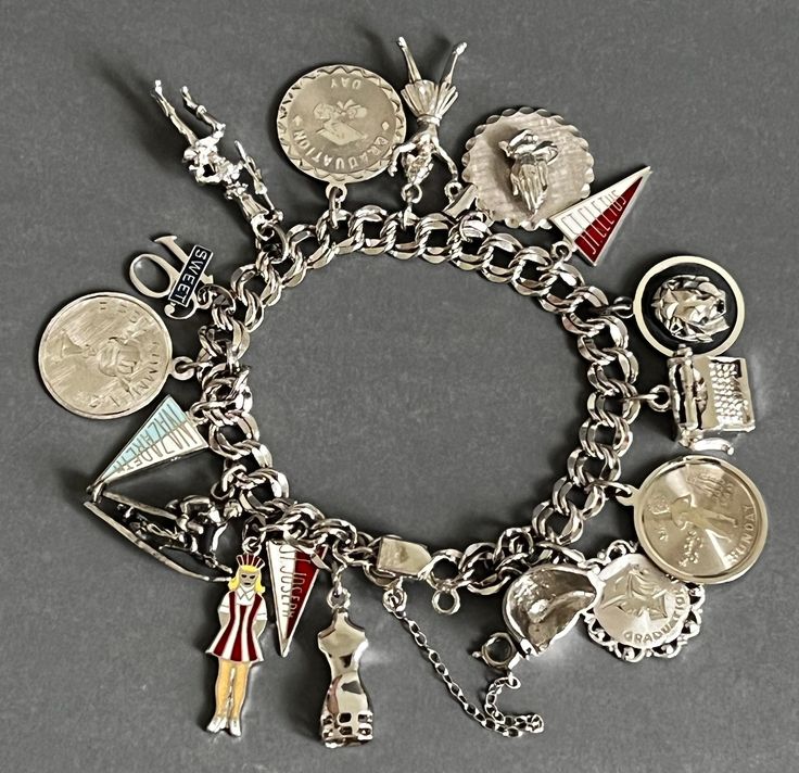 Vintage sterling silver charm bracelet  mark- ELVO sterling  condition- vintage, patina, please look at pictures measures approximate- 7" long weight- 48 grams  J318 Silver Charms Bracelet Costume Jewelry, Sterling Silver Charms Bracelet Collectible, Silver Bracelets With Vintage Charm, Vintage Silver Charm Bracelet As Gift, Vintage Nickel Free Silver Charms, Silver Vintage Charm Bracelet As Gift, Silver Costume Jewelry Charm Bracelet, Retro Silver Collectible Jewelry, Vintage Sterling Silver Bracelet With Charm