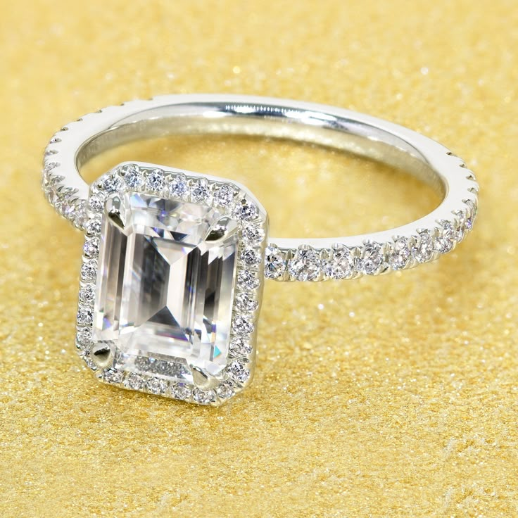 14K Gold Classic 1.75ct Emerald-cut Wrap Halo Moissanite and Diamond Engagement Ring | Earthena Jewelry Emerald Cut Engagement Ring With Halo, Brick Wedding, Emerald Cut Engagement Ring Halo, Emerald Cut Halo, Future Engagement Rings, Emerald Cut Moissanite, Emerald Cut Rings, Emerald Engagement Ring Cut, Engagement Ideas