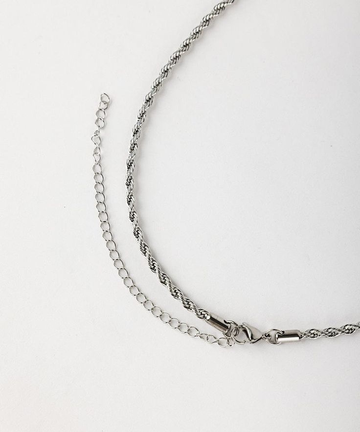 This dainty twisted rope chain band gives a touch of luxe to elevate any hat style + can also be worn as a necklace or layered bracelet. This band comes in one size and adjusts to fit any hat. Adjustable Dainty Lariat Chain Necklace, Dainty Adjustable Lariat Chain Necklace, Adjustable Metal Lariat Necklace With Delicate Chain, Adjustable Delicate Chain Necklace, Adjustable Delicate Chain Lariat Necklace For Party, Adjustable Twisted Jewelry For Everyday, Trendy Adjustable Lariat Choker, Adjustable Delicate Lariat Necklace For Party, Adjustable Snake Chain Jewelry