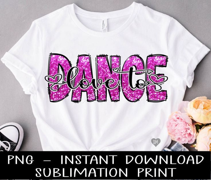 a t - shirt with the word dance on it and some flowers next to it