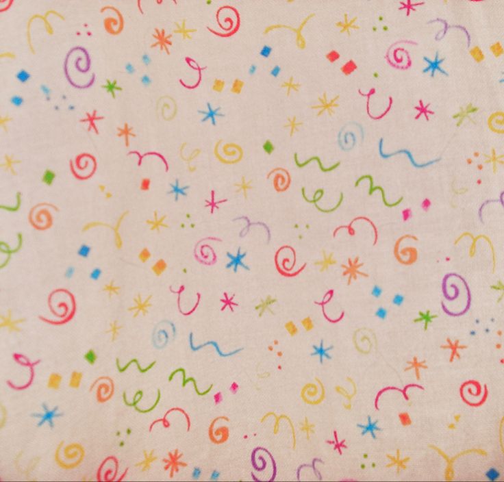 a white background with multicolored stars and swirls on it's surface