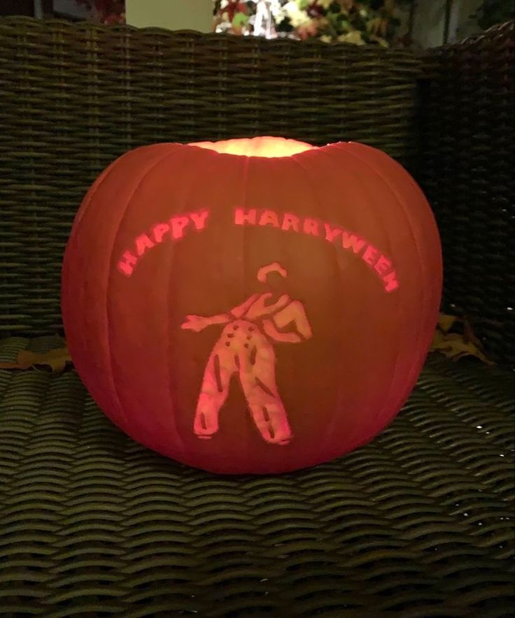 a carved pumpkin with the words happy halloween on it