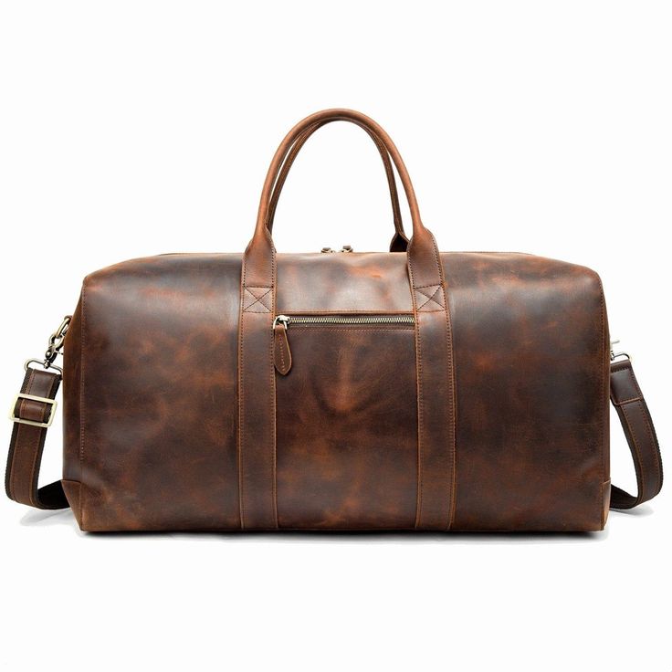 Do you take quick business trips by yourself for a couple of nights or so? This Hanley Leather Duffel Bag is perfect. That's why we take pride in creating leather bags that are strong, durable, and built to last. Whether you're bringing your collection to work, or just wanting to add some style to your day, this duffel bag is the perfect hand luggage piece for the job! It opens wide with two durable handles and its own reinforced canvas case for easy care during travel. Features: Interior: 3 separate compartments, 1 laptop compartment, 1 compartment with zippered pocket, and one regular compartment complete with additional small pockets. It will hold all the essentials, from some clothes to toiletries and everything in between. If you need to take it on the plane as a carry-on, it will eas Leather Bag With Luggage Sleeve For Everyday Carry, Leather Travel Bag With Large Capacity For On-the-go, Leather Luggage With Sleeve For Everyday Use, Soft Leather Luggage For Everyday Use, Leather Bag For Business Trips, Leather Travel Bag With Luggage Sleeve For Daily Use, Leather Shoulder Travel Bag For Business Trips, Business Soft Leather Rectangular Duffle Bag, Large Capacity Leather Travel Bag For Business