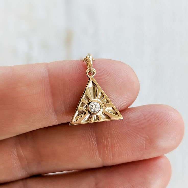 This solid gold diamond Eye of Providence (All Seeing Eye) pendant necklace is the perfect addition to your Egyptian history & culture jewelry collection. It's beautiful and just one of the many spiritual symbols we have available in our shop. Available in 14k and 18k yellow rose and white gold, as well as platinum--just choose your desired metal from the drop-down menu! Details: - Made to order in New York City, USA - Solid 14k, 18k gold or platinum - choose desired metal from drop-down men Tarnish Resistant Diamond Necklace In Fine Jewelry Style, Tarnish Resistant Diamond Necklace Fine Jewelry, Spiritual Diamond Cut Jewelry For Anniversary, 14k Gold Pendant Diamond Necklace For Anniversary, Tarnish Resistant Cubic Zirconia Pendant Necklace, 14k Gold Diamond Pendant Necklace, Gold Jewelry With Diamond Accents, Hallmarked 14k Gold Jewelry In Diamond White, Diamond White Tarnish Resistant Jewelry For Anniversary