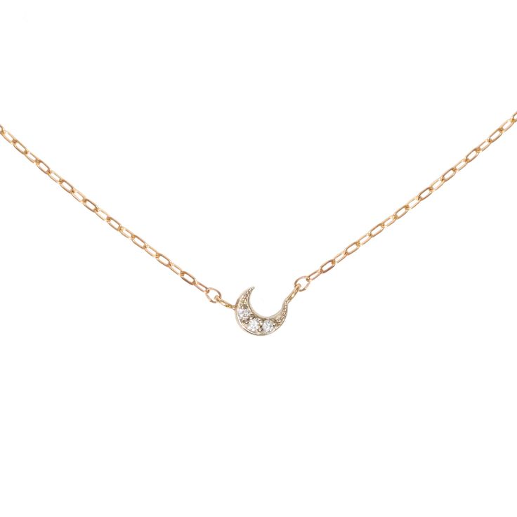 A tiny shining sliver of a moon. Elegant Half Moon Jewelry With Delicate Chain, Rose Gold Crescent Necklace With Moon Charm, Rose Gold Crescent Moon Charm Necklace, Elegant Moon-shaped Diamond Necklace Gift, Dainty Moon Charm Round Pendant Necklace, Fine Jewelry Crescent Moon Charm Necklace, Elegant Moon Charm Necklace, Elegant Moon Phase Pendant Charm Necklace, Elegant Necklace With Moon Charm In Half Moon Shape