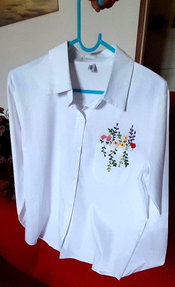 Shirt, Design and Embroidery by hand. White shirt with hand embroidered flowers. Multicolor Embroidered Cotton Shirt For Spring, Cotton Blouse With Machine Embroidery And Long Sleeves, Summer Embroidered Long Sleeve Shirt, Embroidered Cotton Shirt For Spring, White Embroidered Blouse For Spring, White Machine Embroidered Blouse For Spring, Long Sleeve Cotton Blouse With Machine Embroidery, Summer Embroidered Shirt With Multicolor Embroidery, Spring Long Sleeve Tops With Custom Embroidery