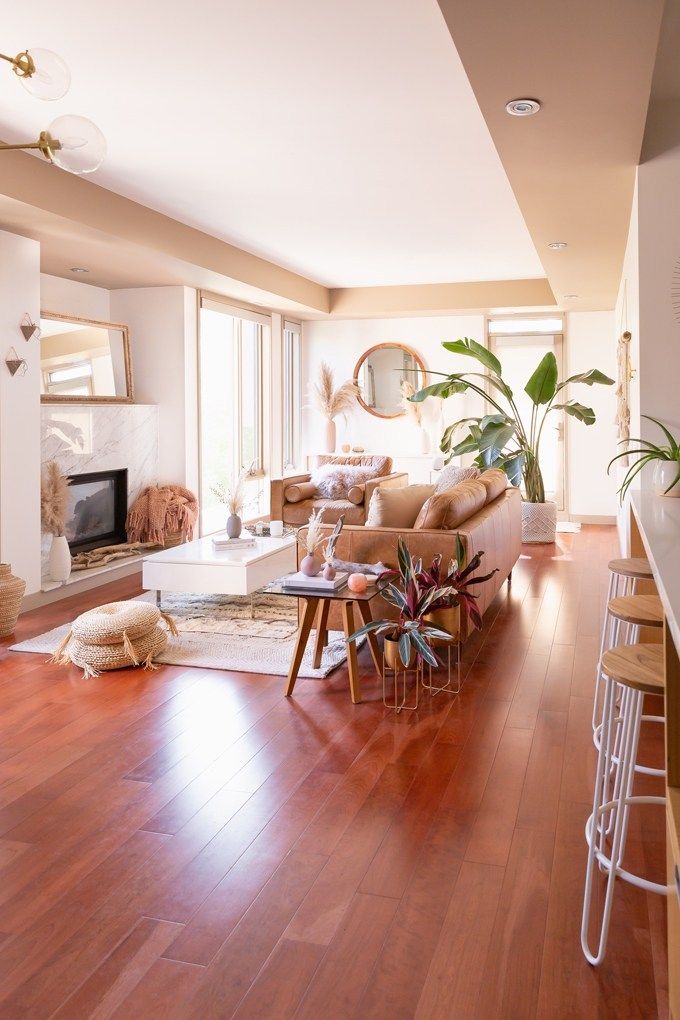 a living room filled with furniture and a fire place