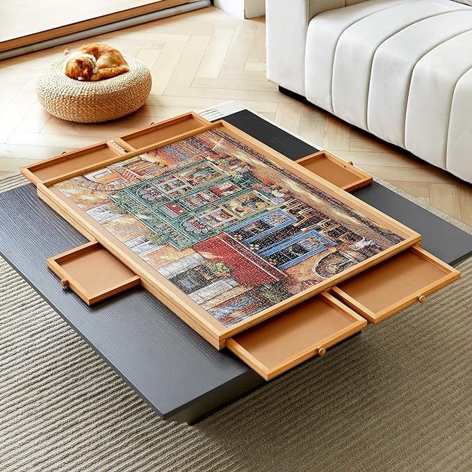 a coffee table with drawers on it in the middle of a room next to a couch