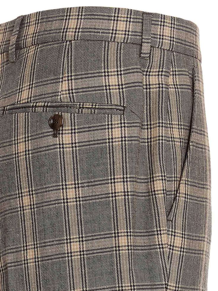 Linen and wool blend Prince of Wales print pants, featuring a zipper, hook-and-eye and button closure, pockets, a straight leg with a central crease. Composition: 52% viscose 48% wool Casual Fitted Gucci Bottoms, Elegant Gucci Pants For Formal Occasions, Classic Gucci Wide Leg Bottoms, Gucci Casual Bottoms With Pockets, Casual Gucci Straight Leg Pants, Casual Wool Dress Pants With Welt Pockets, Casual Gucci Bottoms With Pockets, Elegant Gucci Straight Leg Bottoms, Gucci Fitted Pants For Formal Occasions