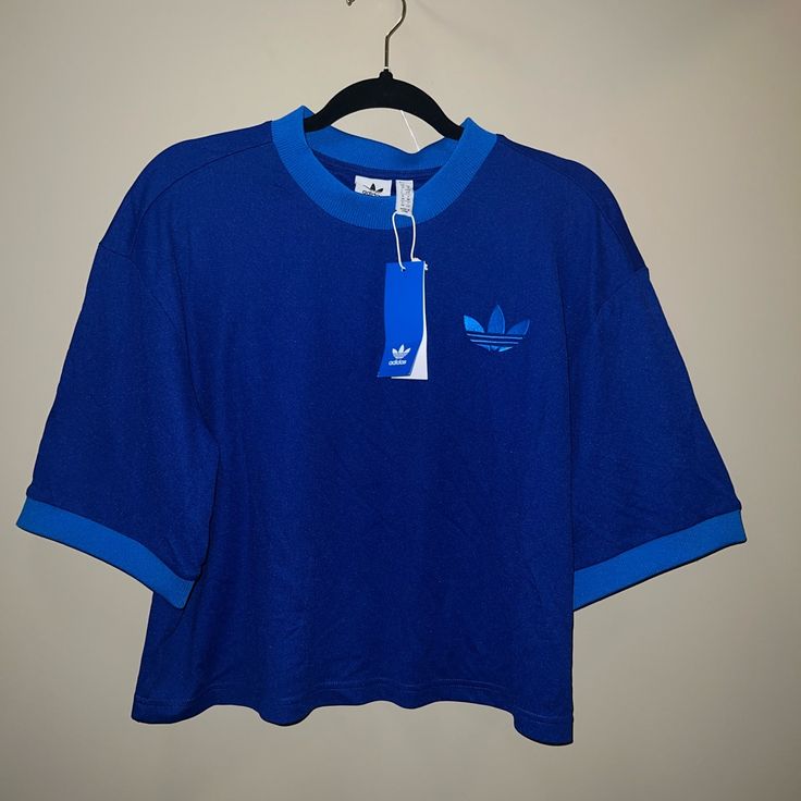 Really Unique Adidas T-Shirt Size Small Brand New Oversized Small Blue Sporty Short Sleeve Shirt, Sporty Short Sleeve Blue Shirt, Sporty Blue Short Sleeve Shirt, Blue Short Sleeve Sporty Shirt, Blue Adidas T-shirt For Summer, Adidas Crew Neck T-shirt For Spring, Adidas Spring Crew Neck T-shirt, Adidas Blue T-shirt For Summer, Adidas Crew Neck Summer Shirt