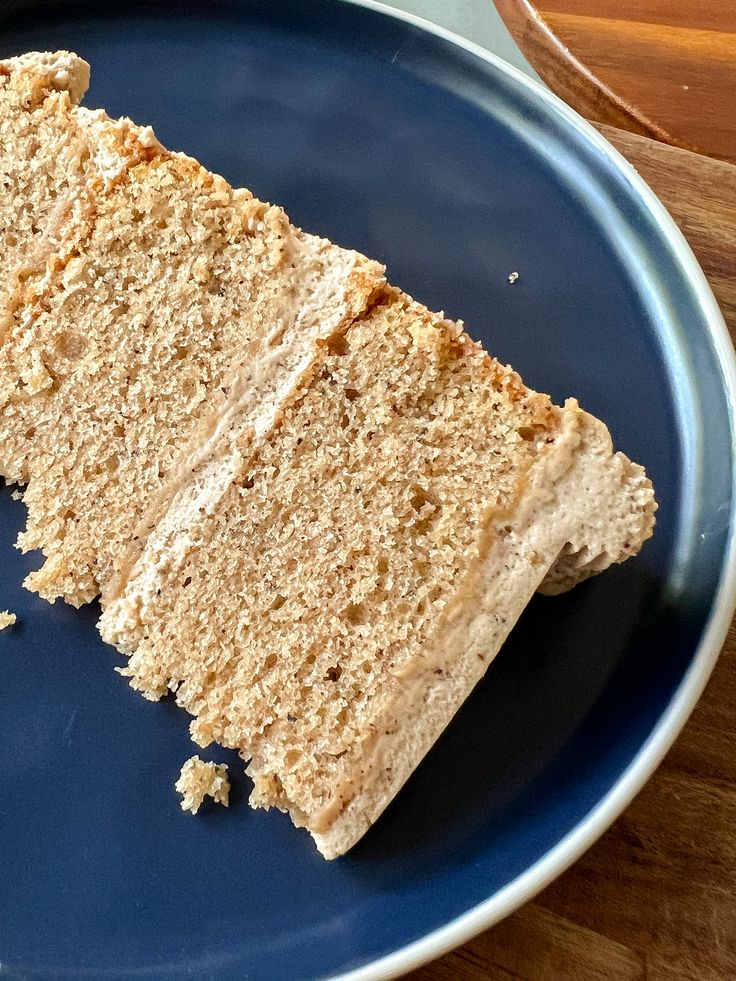 a piece of cake sitting on top of a blue plate