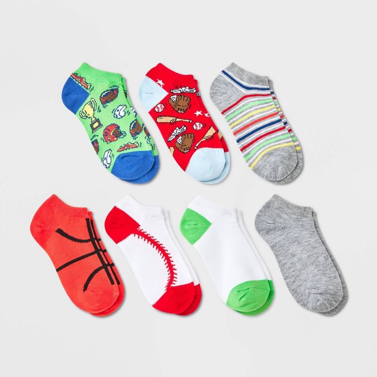 Add a playful, comfy bundle to your little one's sock collection with the Boys' 7pk No Show Sports Socks from Cat & Jack™ in Green. Made with a combination of soft, stretchy fabric, these no-show socks are easy on the feet for prolonged wear. Each pack contains 7, lightweight no-show socks, featuring cool, sporty prints in assorted colors, ready for pairing with various outfits. Cat & Jack™: Kids’ clothing with an imagination of its own. White Socks For Playtime, Green Casual Socks For Playtime, White Sporty Socks For Playtime, Casual Green Socks For Playtime, Casual Cotton Socks For Playtime, Multicolor Casual School Socks, Casual Multicolor School Socks, Sneaker Socks, Sock Collection