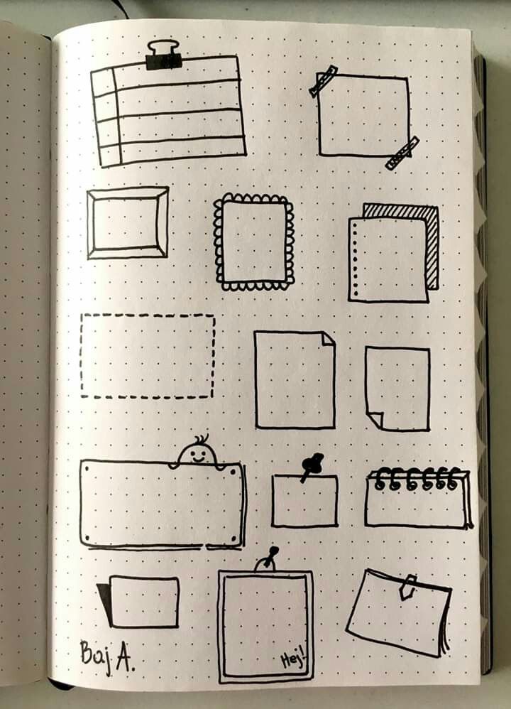 an open notebook with some drawings on it