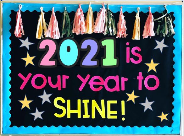 a sign that says, 2012 is your year to shine with tassels hanging from it