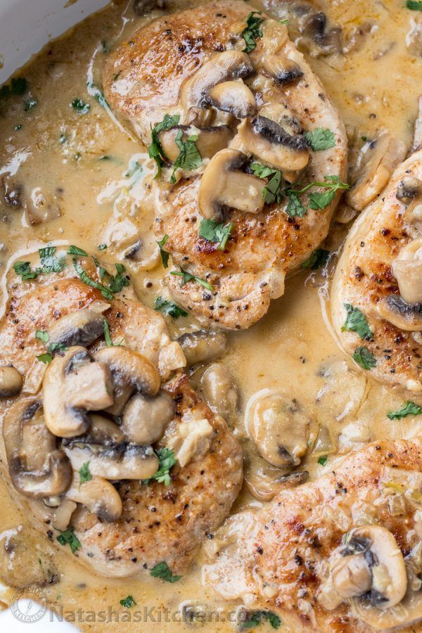 chicken with mushroom sauce in a white pot