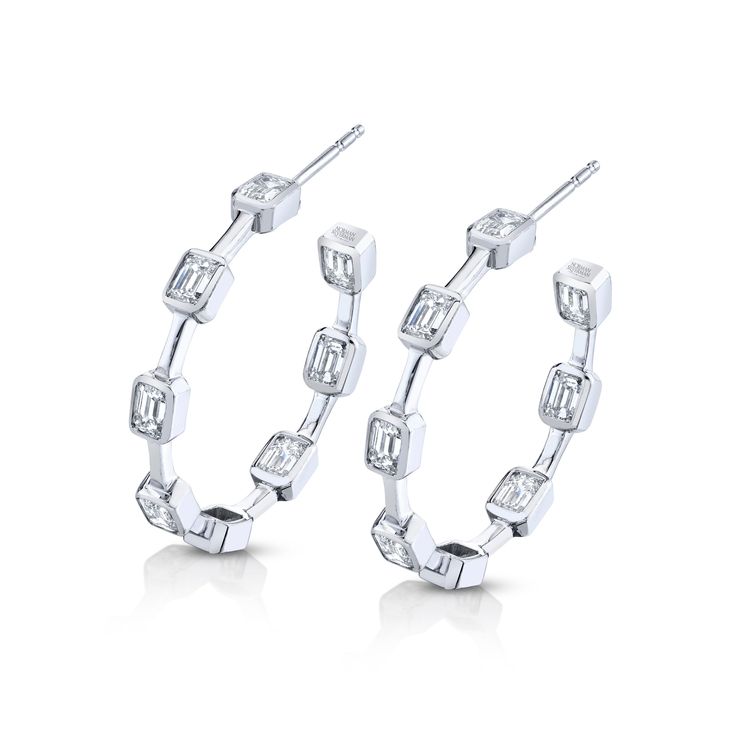 Indulge in the epitome of luxury with our Emerald-cut Diamond Hoop Earrings. The clean lines of the emerald-cut diamonds add a touch of modern sophistication to these classic hoop earrings. Hoop Earring Sets, Oval Cut Diamond, Diamond Hoop Earrings, Emerald Cut Diamonds, Rose Gold Earrings, Touch Of Modern, Emerald Cut, Oval Cut, Earring Set