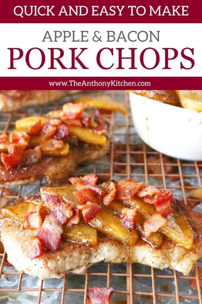 pork chops with apples and bacon on top, sitting on a rack in the oven