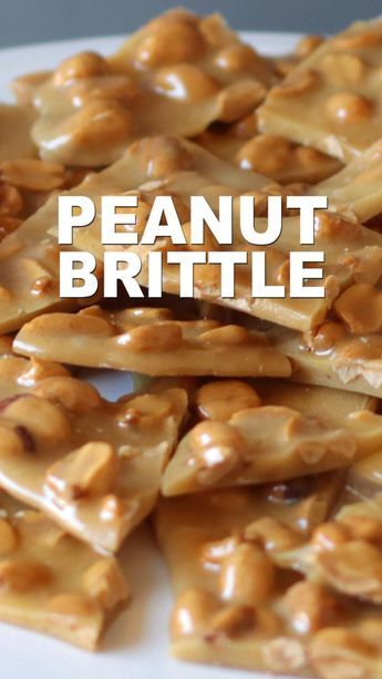 peanut brittle on a white plate with the words peanut brittle over it