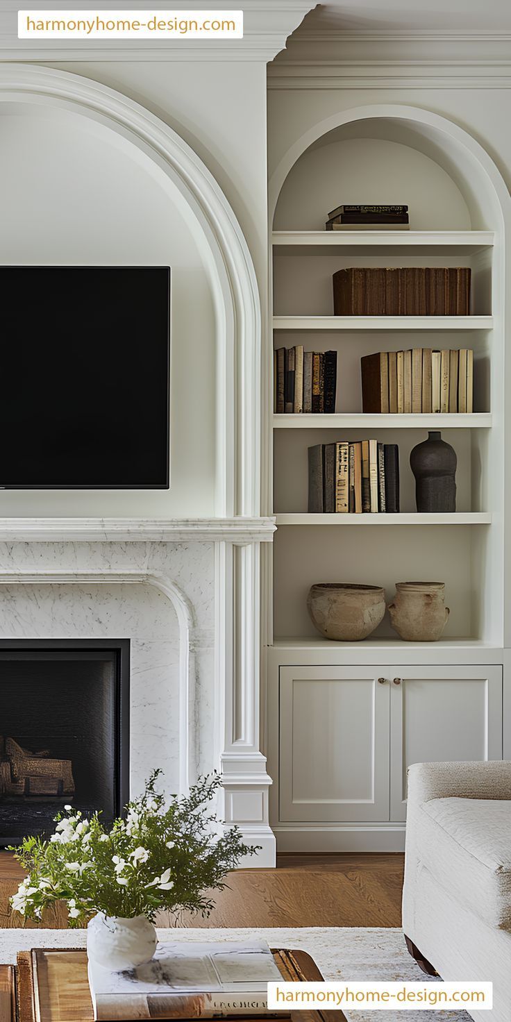 a living room filled with furniture and a flat screen tv mounted on a wall above a fireplace