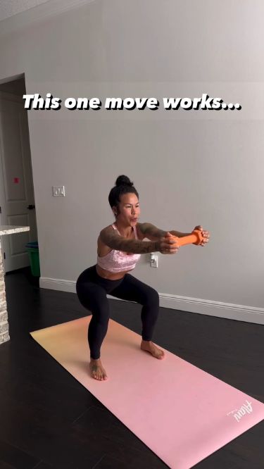 a woman is doing yoga on a mat with the words, this one move works