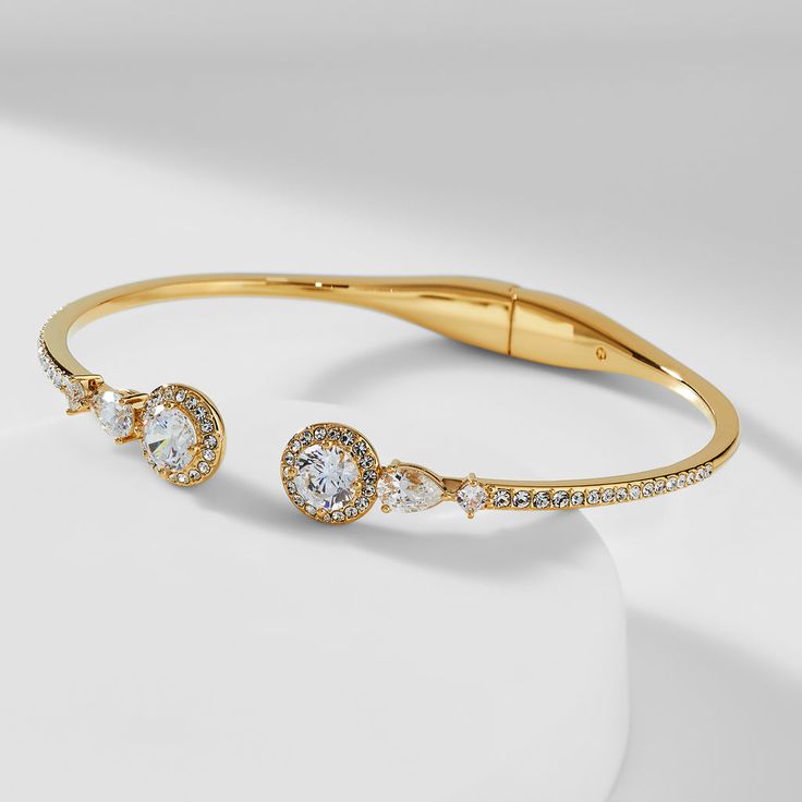 ABOUT THE PRODUCTMetal: BrassPlating: RhodiumStones: Cubic ZirconiaLength: 2in Bow Bracelet, Halo Style, Bracelets Gold Diamond, Ring Watch, Hinged Bracelet, Brass Gold, Fine Jewellery Earrings, Brass Color, Ring Bracelet