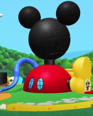 mickey mouse's house is in the middle of an animated scene with goofy ears