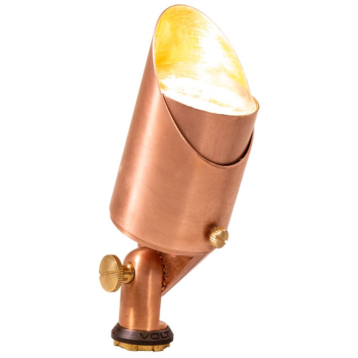 a copper colored lamp with a white light on it