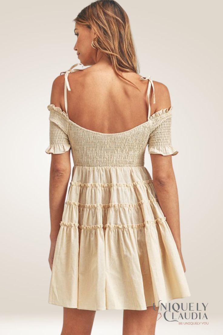 The Leslie Smocked Off-Shoulder Mini Tiered Dress is the perfect mix of femininity, style, and fun! The smocked bodice with ruffled trim clings to your curves in all the right places, accentuating your natural shape for effortless beauty. Add to that the adjustable tie-straps on the off-the-shoulder look, and you have a timelessly sweet style that will turn heads wherever you go. We've then finished it off with four tiers for a flowy A-line skirt will flatter your figure and provide maximum move Femininity Style, Spring Dresses Women, Effortless Beauty, All The Right Places, Sweet Style, Natural Shapes, Affordable Luxury, Tiered Dress, Spring Dresses