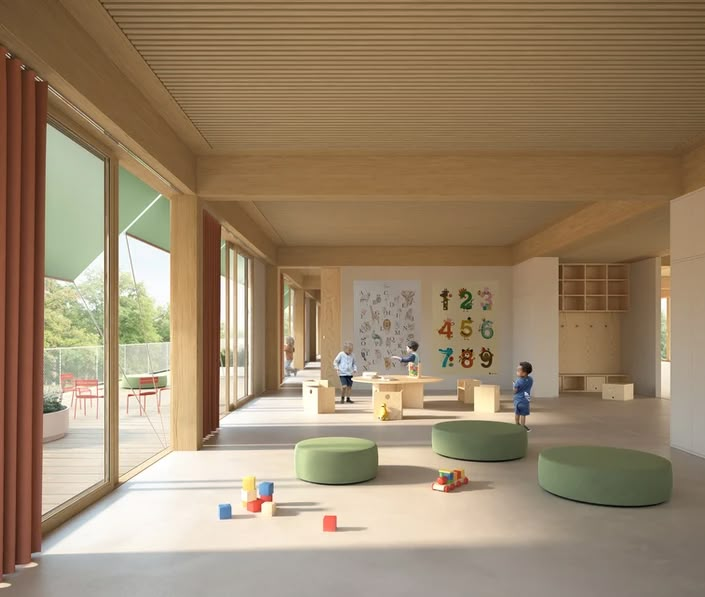 children's playroom with large windows and toys on the floor in front of them