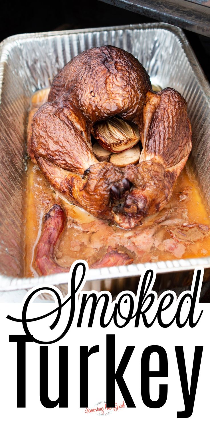 smoked turkey in a pan with text overlay