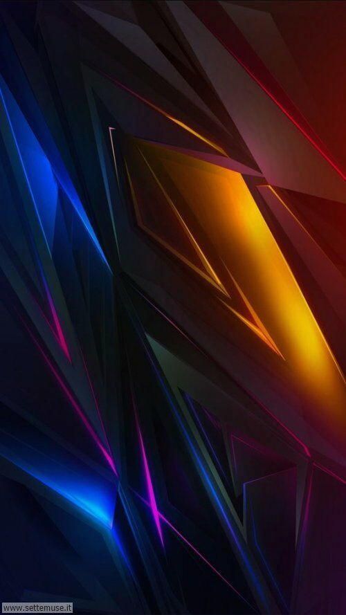 an abstract wallpaper with many different colors and shapes, including blue, red, yellow, purple, and black