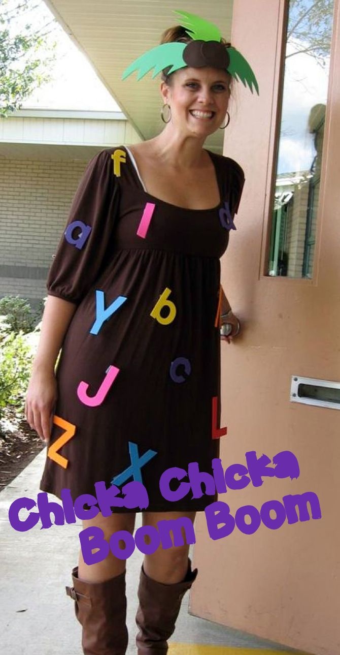 a woman is standing in front of a door with letters on her dress and boots