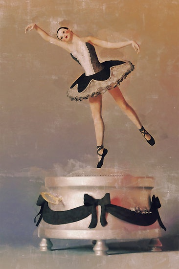 a ballerina is jumping over a silver bowl