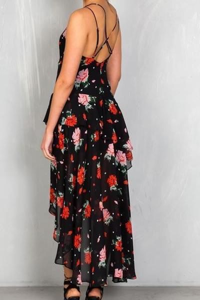 Our Floral Tiered Ruffle High-Lo Maxi Dress is a bestseller! Perfectly draped and flowy, this dress is great for weddings, date nights, parties, or vacation. This dress is sure to stun and get lots of compliments with its criss-cross adjustable straps, high-low hem with subtle ruffles, and beautiful red and black floral print! This dress is a bestseller! Don't wait for it to sell out! Hi-low hem with slight ruffle Criss-cross adjustable straps Back zip closure with hook & eye Lined 100% Poly Flowy Spaghetti Strap Midi Dress For Date Night, Flirty Tiered Maxi Dress For Summer, Flirty Ruched Maxi Dress For Vacation, Flirty Flowy Maxi Dress With Ruffles, Flirty Tiered Maxi Dress For Garden Party, Flirty Flowy Maxi Dress, Flirty Flowy Dress For Vacation, Summer Tiered Maxi Dress For Party, Chiffon Summer Dress For Date Night